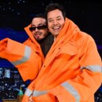 J Balvin Instagram - @jbalvin & Jimmy try on the massive VETEMENTS suit he wore during the @f1 Grand Prix 😭 #FallonTonight The Tonight Show Starring Jimmy Fallon