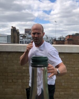 Jason Statham Instagram - #bottlecapchallenge 
#challengeaccepted 
@erlsn.acr 
This thing landed on my head from @johnmayer but will quickly go to a couple of fellas we’ve seen do push ups badly. All yours @guyritchie and @jmoontasri