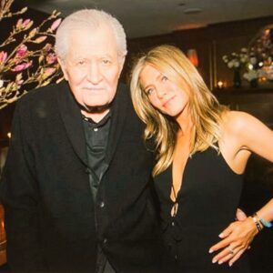 Jennifer Aniston Instagram - Christmas with one of my creators. 
Then and now #TBT
Love you, papa ❤️