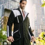 Jennings Brower Instagram - Do you feel the heartbeat of the city? It's bold, vibrant, and always a step ahead: just like our NEW Augment Coat from the Augment Collection! Step into any room with confidence, ready not just to enter it, but command it. . . 🌧️ Waterproof? 100%, yes. 🔥 Fleece-lined? Absolutely. 🎩 Classic Volante design? Always. . . Check it out in the beguiling Blacksword or swipe right for the graceful Gilded Sneaking Suit. Casual or bundled, with four zip pockets for all your essentials, the Augment Coat isn’t setting the fashion standard, it IS the standard. Available now! . . #augmentedwear #mensfashion #menscoat #warmcoat #longcoat #paneldesign