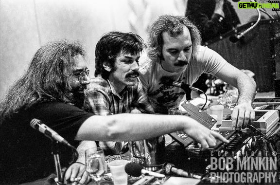 Jerry Garcia Instagram - Flashback to this date in 1979, when the @gratefuldead gathered for a press conference at the NY Hilton after their inaugural Madison Square Garden shows. When one of the tape decks loudly clicked off as it ended, Jerry and Bill simultaneously reached out to flip the tape, caught in this image by @minkinphotography.
