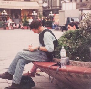 Jessica St. Clair Instagram - The love of my life has a special birthday today and I am so grateful that I have gotten to be in more than half of it. He is 22 in this picture - scribbling in his notebook in Venice, as POETS DO. He has always been my North Star - my inspiration for how to be a true artist, how to be a loving parent and partner. Bebe is the luckiest to have him as a father, and I am the luckiest to get to share this one life with him. Happy birthday, Appa! @bydanobrien