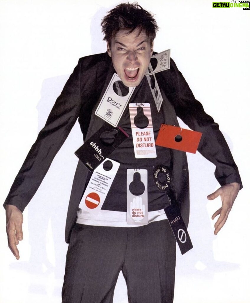 Jimmy Fallon Instagram - 20 years ago for @interviewmag. I saved all of my do not disturb signs from hotels from comedy gigs and sewed them onto a t-shirt. The idea was to hang me on a door and I guess we just went with creepy.