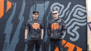 Joel Van Moore Instagram - I'm super excited to announce the launch of my new collaboration with @hilltophoods .This new limited edition Merch range that is available today. Link in bio 
Pressure said “I came to Vans with the idea of doing an urban camo style garment but with his design style rather than the traditional print. Along with redesigning our current HTH logo he came back to me with his own vision, I instantly loved it!” 

We worked in such an organic way and were able to include a real cross section of design ideas into one range. 
The merch will only be available through the Hilltop Hoods store and is available now!   
Link in bio