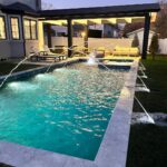 John Colaneri Instagram - Final night swim 🏊‍♂️ of the season! When you have a new pool you want to use it as long as possible. My clients backyard was transformed with the new pool and covered patio area! They are already dreaming about those summer days! @aquaticpoolmanagement #pooldesign #poolconstruction #nightswim #design #designideas #designgoals #backyardtransformation New Jersey