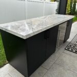 John Colaneri Instagram - The bar area is complete with @sapienstone_usa counter in Arabescato. The bar is by @urbanbonfire in Onyx with black handles. The beauty of these materials is that there is zero maintenance! The counter is porcelain and the bar is made of marine grade aluminum that is powder coated. Thank you to my incredible installers @faithfulcountertops and @distinctively_outdoors. #design #designinspiration #designgoals #outdoorkitchen #outdoorliving #outdoordecoration New Jersey