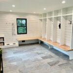 John Colaneri Instagram - With the winter season upon us our mud rooms really get put used in a big way. This transformation for my client gives them the extra storage they needed and large area for kids and pets to dry off from those snowy ⛄️ days. Trim and shiplap by @windsorone Hooks by @schoolhouse #design #designnj #designgoals #designinspiration #mudroomdesign #mudroommakeover #njdesigner #njbuilders