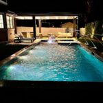 John Colaneri Instagram - Final night swim 🏊‍♂️ of the season! When you have a new pool you want to use it as long as possible. My clients backyard was transformed with the new pool and covered patio area! They are already dreaming about those summer days! @aquaticpoolmanagement #pooldesign #poolconstruction #nightswim #design #designideas #designgoals #backyardtransformation New Jersey