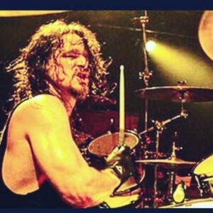 John Dolmayan Instagram - In 1998 system went on our first ever tour , 2 months in the states and ending in a 2 month run in Europe with the incomparable Slayer . Broken down RVs , showering after Serj ( clogged drain every time) , sleeping next to Shavo in the top of the RVs crawl space . Eating for free whenever possible as we were all broke . It was the best ! I first met @paulbostaphofficial at the NAMM show . This was just before our tour and we were talking to all the drum companies about endorsements ( I received none ). Walking down an aisle was Paul , by himself and with a backpack on his shoulder . We were introduced and he gave me some advice spending a good 30 min with me .  This is an example of who Paul is , he didn’t know me from a hole in the ground but he took time to take me under his wing .Months later we were on tour ,I busted through my kick drum . Sako  had both hands on top of his head and was just looking at my kick pedal which had gone through my kick drum head. All of a sudden Paul appeared on stage with a drum key on a drill bit and was helping us takeoff the drum head. He was the headliner, and he was on stage helping the opener change his drum head .I’ll never forget the many acts of kindness that Paul and the wonderful crew and band of slayer showed us. We were in Europe we didn’t have $.10 to our name we were staying in the shittiest hotels if we were lucky enough to get one (usually we just stayed in our bus in the middle of a field somewhere we were showering at the venue )At nights we were playing 20 or 30 minute sets and I’d be sweating ,boiling because we couldn’t afford a fan and then one day Paul had gone and purchased a fan for me because he knew I lacked the funds to get it . Slayer gave us advice, but more than anything they spent time with us watched us play every night. Paul made sure that if I ever needed anything I had it he is a ripping drummer but more important is his character. Paul has had an incredible career playing for some of the best bands on the planet . Hi is an enormously talented drummer , with amazing feel and technique.. I want to take this opportunity to thank him for his many acts of kindness !