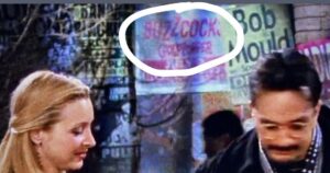 John Feldmann Instagram - One of the best things about playing shows in the 90s was getting a tour poster put on the set of Friends! Not only were the Buzzcocks my favorite band growing up and we were on tour with them at the time but the poster made it in season 7 episode 11 “the one with all the cheesecakes“. I just watched this with @millafeldmann and she was so annoyed with me yelling ‘that’s my band’ over and over. Ha. @goldfingermusic @lisakudrow @hankazaria @irvingplaza @friends