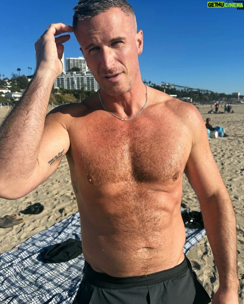 John Hill Instagram - I’m trying to think of a cute caption while my dog poops anyway happy new year from the beach Malibu, California