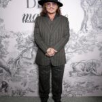 Johnny Depp Instagram - Staying true to his inimitable sense of style, it's been a week of Dior men's hits for @JohnnyDepp at the @FestivaldeCannes 2023. The Ambassador of the Dior Sauvage fragrance joined the cast of "Jeanne du Barry" on the red carpet in a sharp and elegant custom double-breasted tuxedo, wing-tip collar plastron shirt with jewellery buttons and silk pocket square by @MrKimJones. For the film's press conference, the actor donned a grey wool peak-lapel suit with matching vest and black leather boots, while at the Dior x @MadameFigaroFR x @MoetChandon dinner he rocked a chic, striped three-piece suit by the House. Swipe to see the outfits and the #DiorSavoirFaire behind his opening ceremony look.  #StarsinDior #DiorCannes