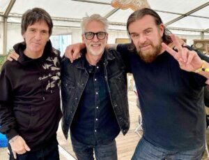 Johnny Marr Instagram - A nice moment with @billyduffyofficial and Howard Bates at @beautifuldaysfestival. Howard was the bass player of Wythenshawe band Slaughter & The Dogs which was the first gig I ever saw aged 12. Thanks again to Billy for playing with us a couple of nights on this tour. Good times.