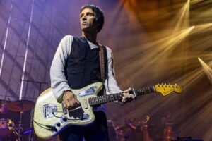 Johnny Marr Instagram - Love and thanks to everyone at the orchestra show. Historic night being the first band to perform at the Aviva. Pic Mike Gray @factory_international