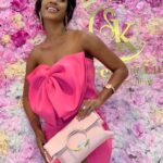 Julia Samantha Edima Instagram - What does a woman always carry in her @kocohlux bag? 👛🥰 Opt for "pink Love Moschino" this weekend 🌸 may it be wonderful ! #kocohlux #pinkmoschinobag