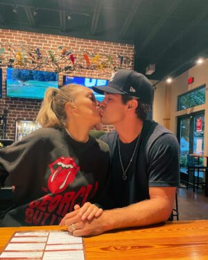 Justin Gaston Instagram - BIG NEWS - got traded to the Braves. Also that’s not true and thirdly, Olivia said we had to smoochie kiss in one of the pictures. So… here you go!