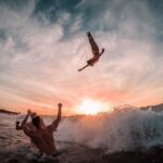 Justin Howell Instagram - Big Sendy to wrap up the week in Costa Rica 🌊 makin em fly with @k_hyms and @nshukers 📸 @camhilts . . . . . #fitfam #fitspo #fitness #workout #getstrong #getfit #bodybuilding #fitspiration #ripped #gym #beachbody #exercise #weighttraining #shredded #aesthetic #squad #cleaneating #eatclean #motivation #costarica #cheerleading #cheer #baskettoss #cheerleaders #cheerleader Tamarindo, Costa Rica