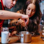 Kamila Rundusová Instagram - Máme tady další recept z Nejbarevnější CESTY, aneb jak na cukrovíčko bez lepku a cukru, které může být skvělou svačinkou během celého roku. Pomerančové marokánky jsou náš hit, stejně jako nová rostlinná kuchařka @chefkamu 📗 a nový supr trupr @souzen.cz zástěry 👘 Kuchařku koupíte za zvýhodněnou vánoční cenu (která platí do neděle 10.12.) na e-shopu Kamilky: WWW.CHEFKAMU.CZ A SouZen zástěry na e-shopu Adámka a Dorotky: WWW.SOUZEN.CZ POMERANČOVÉ MAROKÁNKY 2 hrnky mandlového (nebo jiného) mléka 2 hrnky směsi oříšků (arašídy, vlašské ořechy aj.) 1 hrnek strouhaného kokosu 2 hrnky směsi sušeného a (nebo) kandovaného ovoce 6-10 lžic sladidla (čekankový, javorový sirup, kokosový cukr aj. - slaďte dle chuti) 6 lžic špaldové, ovesné nebo směsné bezlepkové mouky 4 lžíce kokosového oleje nebo (ghí) másla 2 lžíce najemno nastrouhané citrónové kůry 2 lžíce najemno nastrouhané pomerančové kůry 4 lžíce šťávy z jednoho pomeranče 1/2 lžičky soli TIP: Pokud je vaše směs příliš vlhká (hodně záleží na kokosu, zda je suchý), přidejte pár lžic ovesných vloček nebo lněné semínko a na cca 15 minut směs odložte do lednice. Postup ve videu😊 LOVE YOU ALL! A díky moc za support❤️ Vaše Kamilka, Adámek a Dorotka @chefkamu , @arundus_ a @dorota_dostalova Za prostory a asistenci děkujeme @teryna.cz a foto dokumentaci @pietra_fotografka #videorecepty #vanocnirecepty #christmas #vanoce #videorecept #rostlinne #vegan #veganskerecepty #veganrecipes #bezlepku #glutenfree #christmasrecipes #cukrovi #souzen #chefkamu #vanocnicukrovi #marokanky #cokolada #dezerty #zdravedezerty #zdravepeceni #bezcukru #cukrfree #cukrfreerecept #bezlepkoverecepty