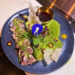 Kamila Rundusová Instagram - This is our catch of the day. Help me to choose the presentation. 1, 2 or 3?😋 It’s wild tuna caught by my husband @robiczech , which I turned into Japanese style tuna tataki. Served with purée made of green peas, avocado and wasabi, with hibiscus ponzu sauce and rice crackers. 🌿Good news for plant based people is that we serve this dish also with our homemade fermented tempeh made of red beans which is super delicious! I personally love it so much! Tempeh tataki is my new favorite thing on the menu. RECIPE FOR THE GREEN PURÉE Try to make the purée at home, it’s awesome! In a blender blend about 250g defrosted green peas, 1 ripe avocado, 50ml of coconut milk and season with wasabi, lime juice and salt accordint to your tastebuds. Amazing💚💚💚 See you tonight at @___mycelium___