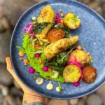 Kamila Rundusová Instagram - This dish has become a bestseller on our brunch menu at @___mycelium___ . It is our version of fish & chips🐟🍟🫛 We get fresh mahi mahi from a local fisherman, we marinate it, we cook it in sous-vide and then we fry the fish in Japanese tempura. Instead of classic chips, we make our smoky yuca & corn croquettes. Served with pea & wasabi puree, greens and mayos. Plant based option with homemade tempeh is available. Opening hours: Wednesday till sunday from 9-2pm for breakfast, coffee or brunch or come for a dinner from 6-10pm. Also there is our beloved @_karicasco with her pilates from 8am tomorrow🤸🏽‍♀️ See you at @___mycelium___ ✨