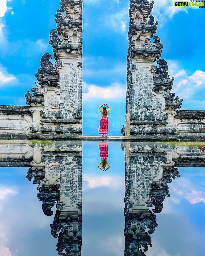 Kanisha Malhotra Instagram - Have you ever see heavens gate? Well I definitely have at this particular place. It is called ‘Lempuyang Temple’ a.k.a Heavens Gate which is situated in East Bali. It is around 2 hours drive from Ubud, and this place definitely has my heart for its beauty. Such a eye pleasing & holy temple this is. As one of the oldest temple in Bali, it attracts many tourists. But it is not as hunky dory as it seems. I am soon going to show you what actually goes behind taking such iconic pictures at this pretty tourist spot in Bali. Stay tuned for more details. Meanwhile just enjoy this beautiful picture of Heaven’s Gate. #heavensgate #bali #lempuyangtemple #baliindonesia #balidiaries #kanishamalhotra #travelwithkani #explore #mostinstagrammable Lempuyang Temple, Bali, Indonesia