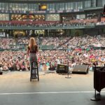 Kelsey Cook Instagram - What an unforgettable weekend 🥹 Flew to Memphis and OKC to watch @thatchaddaniels on the @bertkreischer stadium tour, and got surprised with guest spots in front of the biggest crowds I’ve ever performed for. Thank you so much Bert and @leeannkreischer for absolutely everything. It was a dream. Gonna post about this for a week straight ok bye 👋🏻 AutoZone Park