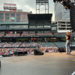 Kelsey Cook Instagram - What an unforgettable weekend 🥹 Flew to Memphis and OKC to watch @thatchaddaniels on the @bertkreischer stadium tour, and got surprised with guest spots in front of the biggest crowds I’ve ever performed for. Thank you so much Bert and @leeannkreischer for absolutely everything. It was a dream. Gonna post about this for a week straight ok bye 👋🏻 AutoZone Park