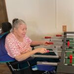 Kelsey Cook Instagram - Happy Mother’s Day to the foosball queen and the most amazing mom on the planet 👑 Two years ago, my mom was diagnosed with Frontotemporal Dementia. She spent five months in the hospital, has gone on and off hospice multiple times, and has pulled through at every turn. She is by far the strongest person I’ve ever known. If you also have a parent with dementia, know that you’re not alone. It can feel isolating to care for a loved one going through this disease, but as I’ve started to open up more about it, I’ve been overwhelmed by the amount of people who are going through something similar. Thank you to everyone who’s sent incredibly thoughtful emails to our podcast’s account ❤️ they’ve made a huge difference for me and I appreciate it so much 🫶🏻
