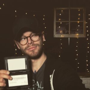 Kenton Duty Instagram - “Trying to get that lighting right” selfie (and yes, that’s a shirt pen. It’s quite handy for when you need to take notes and lose pens often) #director #shortfilmshoot #shortfilmtalldirector