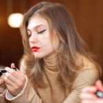 Klelia Andriolatou Instagram - My Christmas Glam is all about red lips, sharp eyeliner and dramatic eyelashes. @erreduemakeup #ERREDUE #makeup #GlitterGala #xmasmakeup