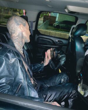 Kourtney Kardashian Barker Instagram - One year ago today, an Elvis impersonator married me and @travisbarker after the Grammys and way too much tequila in a chapel in Las Vegas! It was one of the best nights of our lives, dreaming of a lifetime filled with fun adventures together.  And yes, that’s me about to throw up on the floor in the car. 🥂 Thankful to @clemente_310 @kevinhwolff for all the iPhone footage so that I could remember the night 🪩🤪 also, I ended up losing this jacket that night, which I had for ten years, with the little cute heart studs and there’s a reward if anyone finds it 🕵🏻‍♀️