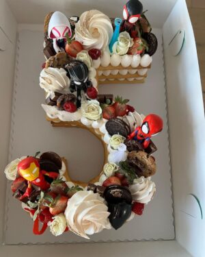 Kristen Schaal Instagram - My Ruby turned 5 and I got this gorgeous cake from @crumbles__patisserie! Thank you! They make fun cakes in Encino and they let us add Ruby’s favorite SpiderMan characters to take a much needed break fighting bad guys to celebrate. Happy birthday to Ruby!