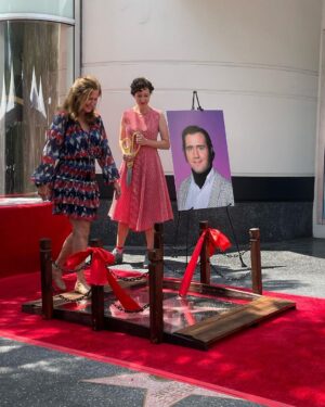 Kristen Schaal Instagram - Today I donated the first ever @hwdwalkoffame Foot Bridge at Andy Kaufman’s ceremony. My hope is that no one’s dirty feet, dog shit, bird shit, or gum will ever touch his precious star that took 40 years after his death to get. I also donated a rug to go over the bridge to keep it clean too. Thank you to Arturo Guzman and his friend for building it, Rich Blomquist for the rug idea (zoom in on rug), the Kaufman’s for letting me be a part of this historical event, and to Andy for the inspiration.