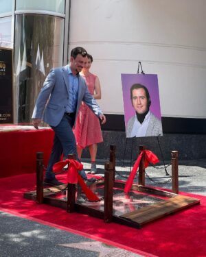 Kristen Schaal Instagram - Today I donated the first ever @hwdwalkoffame Foot Bridge at Andy Kaufman’s ceremony. My hope is that no one’s dirty feet, dog shit, bird shit, or gum will ever touch his precious star that took 40 years after his death to get. I also donated a rug to go over the bridge to keep it clean too. Thank you to Arturo Guzman and his friend for building it, Rich Blomquist for the rug idea (zoom in on rug), the Kaufman’s for letting me be a part of this historical event, and to Andy for the inspiration.