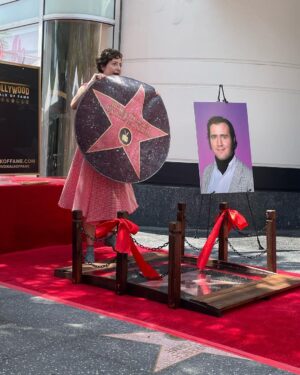 Kristen Schaal Instagram - Today I donated the first ever @hwdwalkoffame Foot Bridge at Andy Kaufman’s ceremony. My hope is that no one’s dirty feet, dog shit, bird shit, or gum will ever touch his precious star that took 40 years after his death to get. I also donated a rug to go over the bridge to keep it clean too. Thank you to Arturo Guzman and his friend for building it, Rich Blomquist for the rug idea (zoom in on rug), the Kaufman’s for letting me be a part of this historical event, and to Andy for the inspiration.