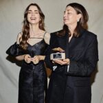 Lily Collins Instagram - Smiling from ear to ear at last night’s @elledanmark Awards in Copenhagen. What an honor to present Designer of the Year to @caroline_engelgaar for @mkdtstudio and spend such a fun, fashionable evening with @charliemcdowell and our dear friends @stinegoyahertz and @thomasgoyahertz who also took home a prestigious award! Congratulations to all the winners and nominees! And thank you for including us in such a special celebration…