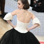 Lily Collins Instagram - In true fashion. Thank you @verawang for paying homage to the man of the evening - the late, great #KarlLagerfeld - in the most stunning of ways. I was so honored to go with you and celebrate your longtime friend in such an incredible custom design. Special thanks to my brilliant team and my @cartier family for an extraordinary night at the museum… Metropolitan Museum of Art