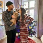 Lily Collins Instagram - The process of getting our holiday photo involves lots of @redforddog kisses (plus a cute cozy sweater) and we’re not complaining. Merry Christmas, everyone! From our lil family to yours…