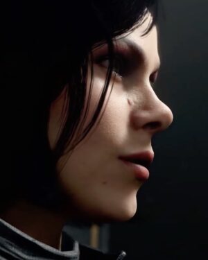 Lily Cowles Instagram - When I was about 11 years old, some unsuspecting family member gifted me Tomb Raider III for my iMac, and I never looked back. Proof that women could be brilliant, ballsy, and badass—with a great ass—Lara Croft was my first girl crush and the last video game character I ever played. Because I got stuck in the jungle and couldn’t make it to the next level and eventually moved on with my life. But I never forgot her. In fact I subconsciously modeled my life after her. 
Now, decades later, I have the immense pleasure of embodying my very own badass female hero: agent Helen Park, of MI6. Working on Park was the joy of 2020 for me, and I’m so grateful to all those who helped bring this character to life in the newest installment of Call of Duty: Black Ops Cold War. 
Thank you @callofduty @isenbergcasting @ravensoftware @treyarch @activision, @amandawped @drktrick @mikecurranart @daveb2 and all the amazing crew who dedicated their time and attention to this epic game. To my mates in combat: @mr.brucethomas @coachwithreg @damondayoub @damonvallen_ @chrispaynegilbert @piotr.michael ... we’ve got a job to do. 
One final thought: thank you to the designers who insisted on keeping my mole for Park. A mole that was the source of much criticism and disgust my first few years as an actor. That hours would be put into digitally recreating my mole, frame after frame, warms my heart 🟤