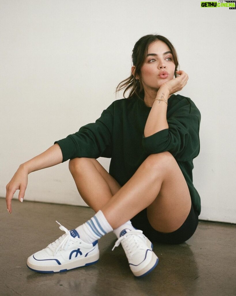 Lucy Hale Instagram - When Lucy met Løci 🖤 Everyone meet my favorite sneakers! Thrilled to team up with a brand that combines style and purpose. @loci_wear sneakers (pronounced low-key) are 100% Vegan, Cruelty Free and Unisex. Ethically produced and handmade in Portugal. You can find my favorites at the link in my bio 👟