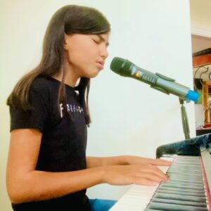 Madison Taylor Baez Instagram - I have been working on this song by @brunomars for a few days now. I never sing a cover song like the original artist. I will change it musically and vocally to fit my style and range. I’m 10 and first started reworking songs at was 7. I hope you like it I will keep working on it and post the full version next week when it’s better and I have worked everything out.
.

•
#youngselenanetflix #latinactor #actor #madisontaylorbáez actress #selena #youngsinger #singing #singer #singers #selenaquintanilla #selena #selenanetflix #schullerkids  #tvactor #musician #musicislife #madisonbaezmusic #followme #schullertalent  #brunomars #musicvideo @brunomars #agt #agtauditions