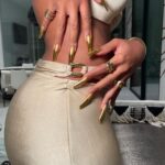 Megan Thee Stallion Instagram - We had this SS 1997 @pacorabanne sitting in the closet waiting for the perfect moment! Love you @luxurylaw thank you @juliendossena