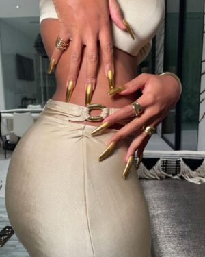 Megan Thee Stallion Instagram - We had this SS 1997 @pacorabanne sitting in the closet waiting for the perfect moment! Love you @luxurylaw thank you @juliendossena