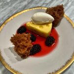 Michael Voltaggio Instagram - Lemon curd made with cream cheese instead of butter = lemon curd cheesecake 600g lemon juice 600g sugar 6 eggs 6 egg yolks 8 sheets gelatin 600g cream cheese 2 scraped vanilla beans Heat lemon juice, vanilla bean, and sugar to 180f, add bloomed gelatin leaves, temper in eggs, cook on double boil until coats a spoon, mix in mixer with cream cheese, pour into fancy cheese shape molds bought from Amazon, freeze, remove from mold, defrost, eat with sauce and fruit and stuff