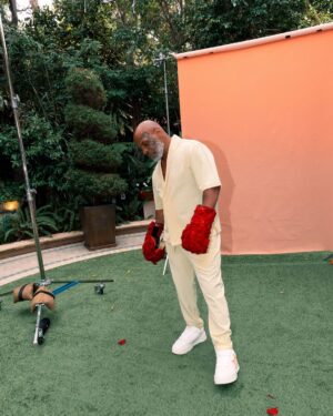 Mike Tyson Instagram - “Yes, those are rose petals on my gloves. Packs a sweeter punch“
