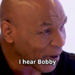 Mike Tyson Instagram - How did Mike Tyson become the youngest heavyweight champion of the world and one of the greatest fighters of all-time? It wasn’t easy. It started outside of the ring with a man named Bobby Stewart, a tough guy from the neighborhood who challenged Mike to show respect to others, to work hard in school, and to improve himself. In just a few months, Mike went from a fourth-grade reading level to a seventh-grade reading level. Bobby was impressed, became Mike’s trainer, and taught him how to fight, pushing him to his limits EVERY DAY. Like everybody who aspires to greatness and success, Mike got knocked down many times – BUT HE NEVER GAVE UP. 💥 He was determined, focused, and had a dream to be a champion. LINK IN BIO to the full episode! @miketyson @randallkaplan #MikeTyson, #IronMike, #Tyson, #TysonLegacy, #Champ, #BoxingLegend, #BoxingGreat, #TysonInspiration, #KnockoutKing, #TysonFan, #MikeTysonQuotes, #TysonChallenge, #BoxingIcon, #TysonMode, #TysonComeback #inspiration #dream #hardwork #champion #inspiration #preparation #extremepreparation