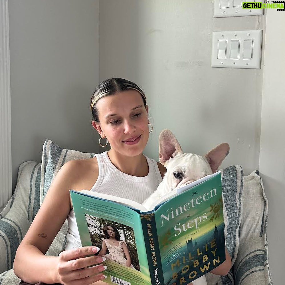 Millie Bobby Brown Instagram - It’s finally here! I’m holding my first finished copy of my debut novel Nineteen Steps – I can’t wait for you all to read it. It’s out in just 3 weeks. I’m so excited to hopefully see lots of you on my Nineteen Steps book tour! I’ll be in London, New York, Atlanta and more talking about the book and signing your copies. Tickets are available from the link in my bio. See you in September!