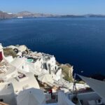 Natalie Negrotti Instagram - First time in Oia Santorini and I’m blown away by it’s beauty. My feet got so swollen I had to wear my pink shower chanclas to sight see before I bought matching Greek made sandals with my prima since my sneakers didn’t fit me! 😂 we rented a convertible red Fiat 🚗 and drove around exploring Santorini, Greece Oia, Santorini