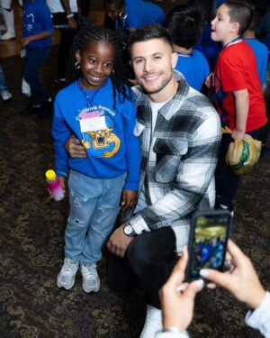 Nick Barrotta Instagram - spent my morning hanging with these awesome kids! 💙 thank you to the american giving project/ toys of hope team for having me back this year — and thank you for all you do for these children and families! today was a great reminder of what the holiday season is all about 🙏🏼💫 #toysofhope