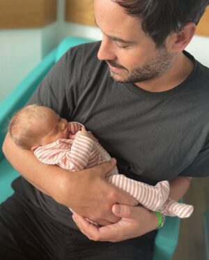 Nicki Shields Instagram - She’s arrived! Alyra (pron: a-lie-ra) Lily Sainthill. 7 lbs 3 oz. 🥰

We are beyond besotted. Her brothers seemingly adore her and haven’t poked an eye out (yet!). 

I can’t quite believe it. Am I really a mum of three ? 😳. It feels so surreal saying that out loud. I’m sure it was only yesterday we were getting married in Ibiza, partying without a care in the world! 

Having Alyra, the third (and final!) addition to the family makes it feel so complete and seeing the three kids together is just magical… I just need to work on my own magic now and grow an extra pair of hands… 

Huge thank you to all the doctors, nurses and midwives at Queen Charlottes Hospital. The treatment we’ve had from the moment I fell pregnant to leaving hospital with Alyra has been incredible throughout, especially the team who carried out my c-section and the nurses who cared for us after. 

Biggest thank you of all to my amazing husband @marksainthill, the calm voice throughout all the madness and juggling every thing behind the scenes. We couldn’t do it without you. 

Now - who’s got advice on bringing up a teenage girl? Given the circles I ran round my parents it’s probably best I start prepping now!!! 

#babygirl #newborn #AlyraLily #familyof5 #3under5 #family #queencharlottes #nhs